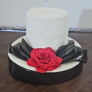 Elegant White and Black Hat with Red Flower